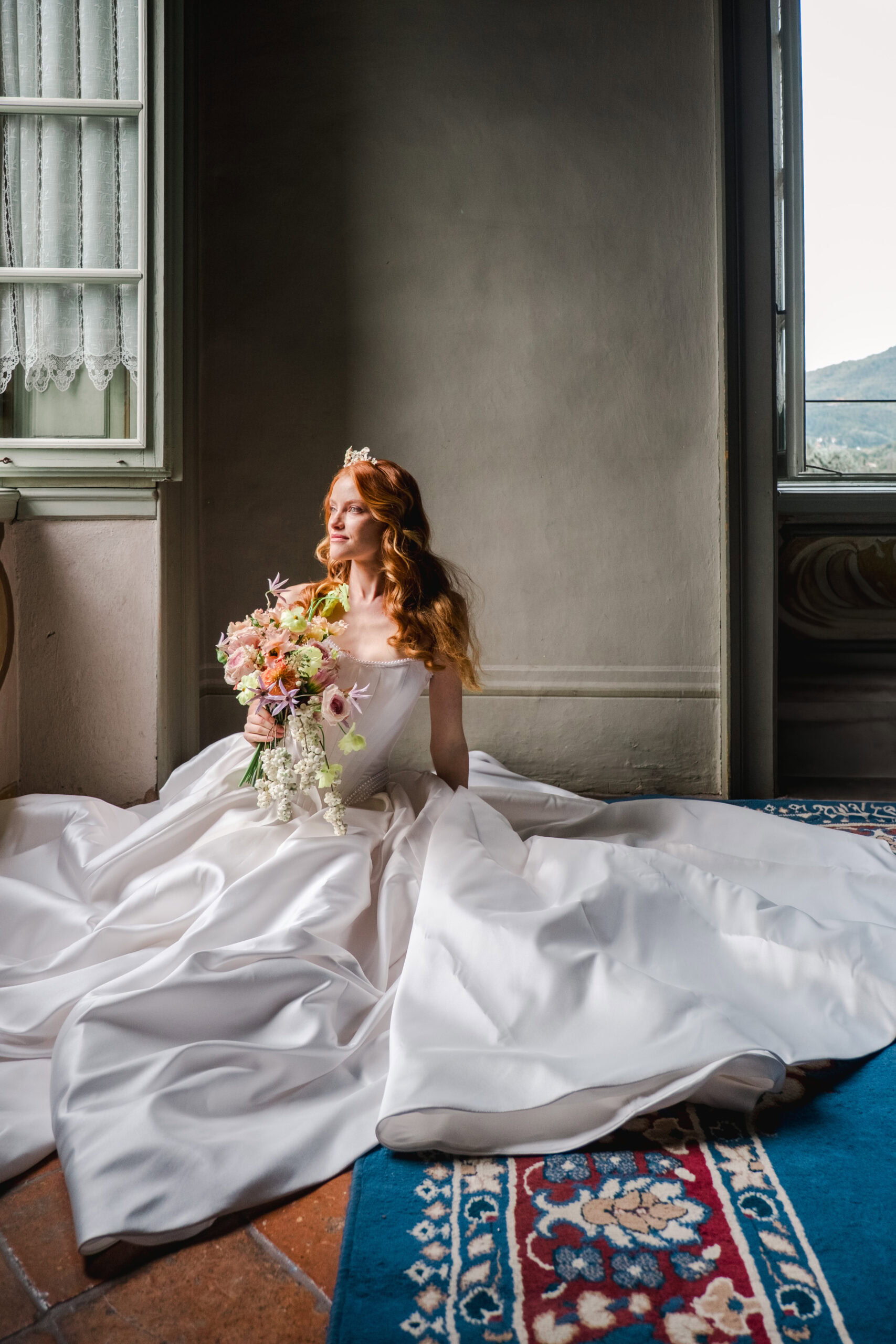 Bride in princess wedding gown posing at an Italian villa in Milan