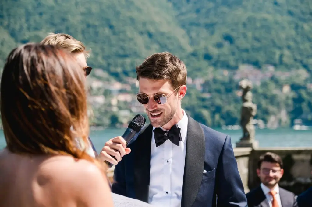 Groom reading his heartfelt vows to the bride during the Villa Pizzo wedding ceremony.